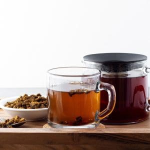 Prepared forest tea in a glass cup